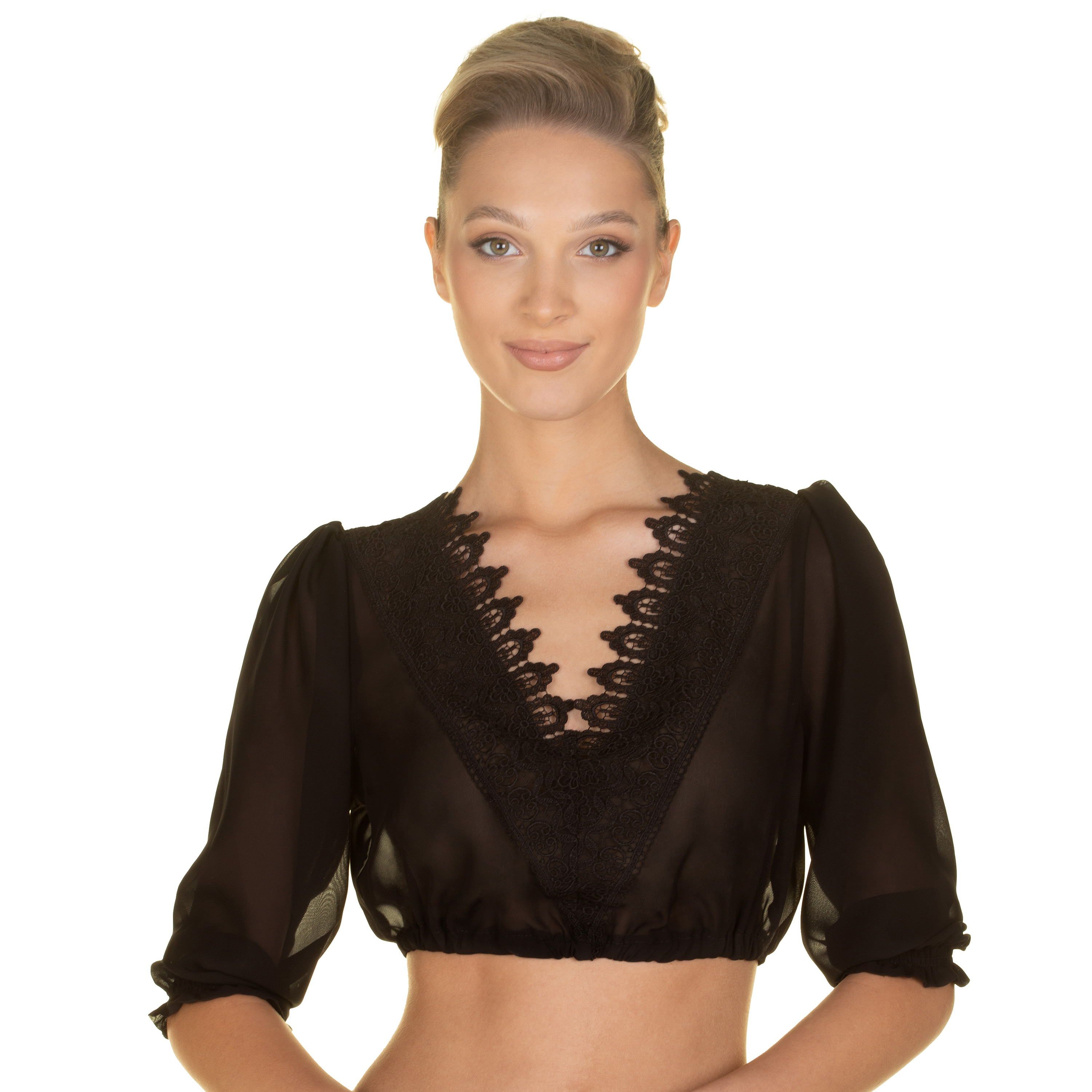 Vorderansicht der Damen Dirndlbluse "Teodora" in der Farbe Schwarz von einem Model getragen