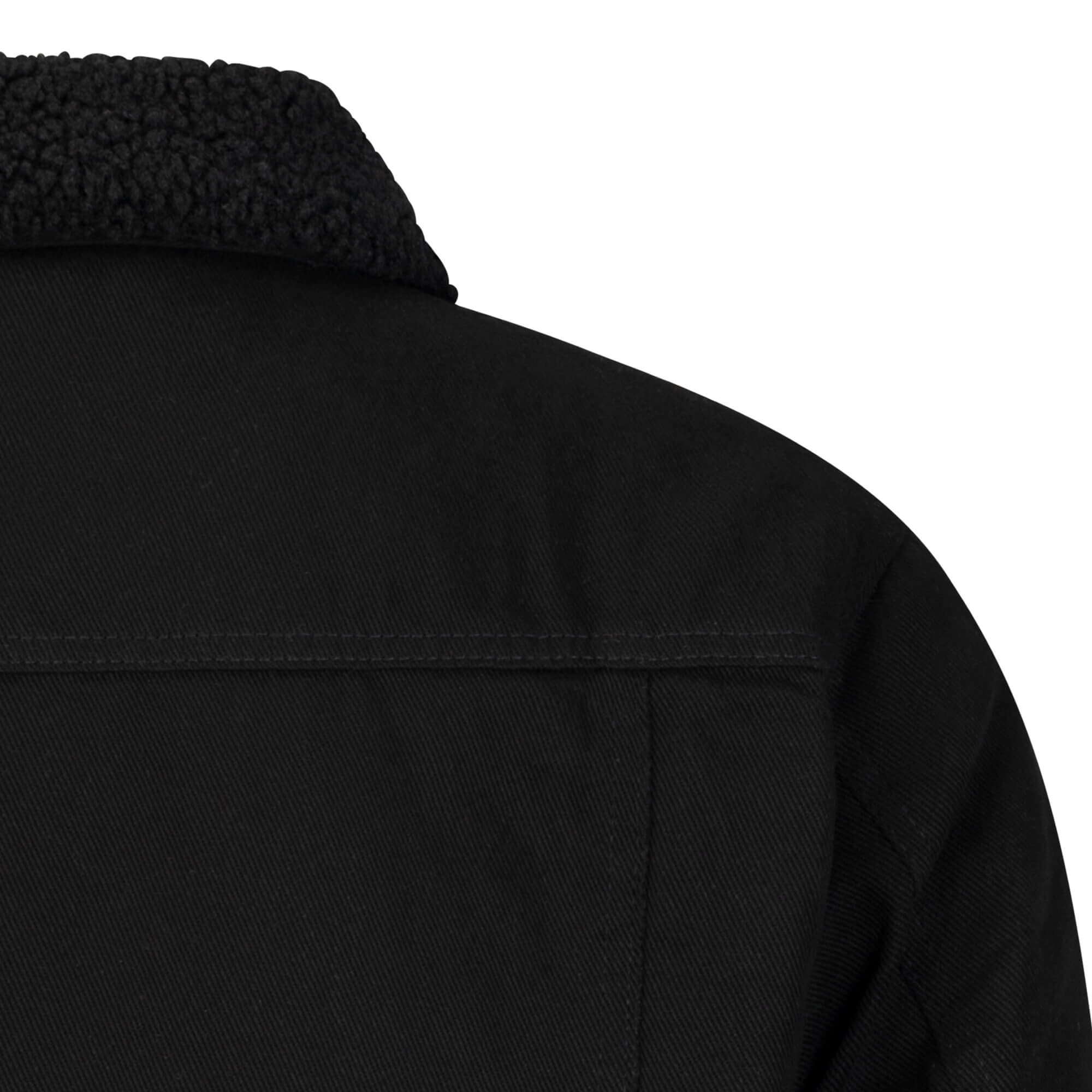 Detailansicht der Herren Twilljacke in der Farbe Schwarz mit schwarzem Teddyfutter