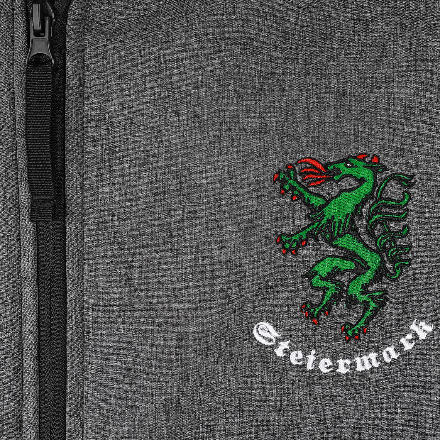 Vorderansicht der Herren Softshelljacke "Steiermark", in der Farbe Grau, Detail Logo